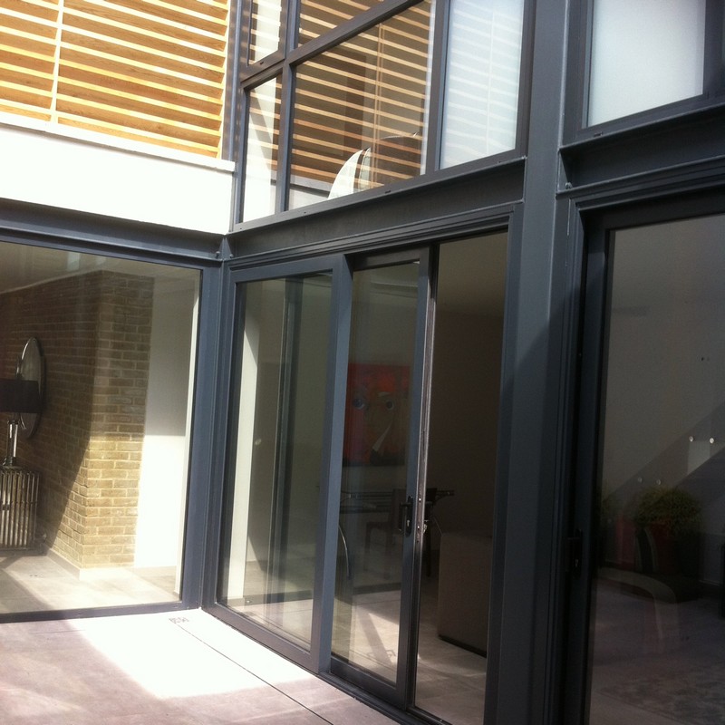 Anthracite aluminium sliding patio doors fitted in Wolverton