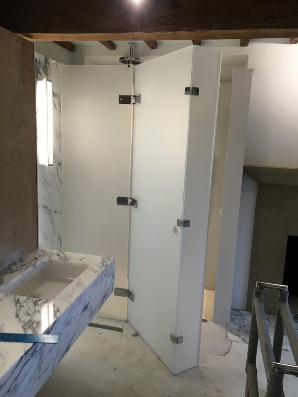 Bespoke frosted glass shower enclosure in Wolverton luxury bathroom